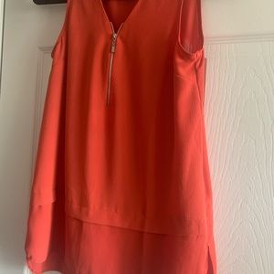 Beautiful orange sleeveless shirt